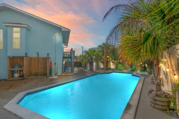 Latitude Adjustment ~ Stylish Beach Retreat with Heated Pool, Game Room & Easy Beach Access - Image 1