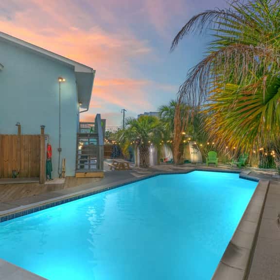Latitude Adjustment ~ Stylish Beach Retreat with Heated Pool, Game Room & Easy Beach Access - Image 1