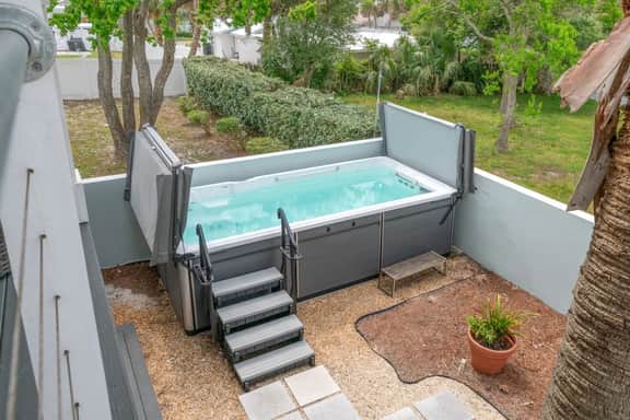 Paradise Palms ~ Pet-Friendly Beach Retreat with Heated Swim Spa & Balcony - Image 3
